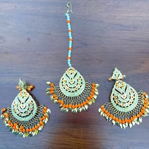 Orange earrings and tikka set.